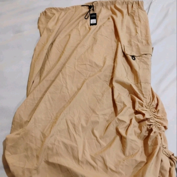 Fashion Nova Dresses & Skirts - Fashion Nova Asymmetrical Tan Skirt with Drawstring